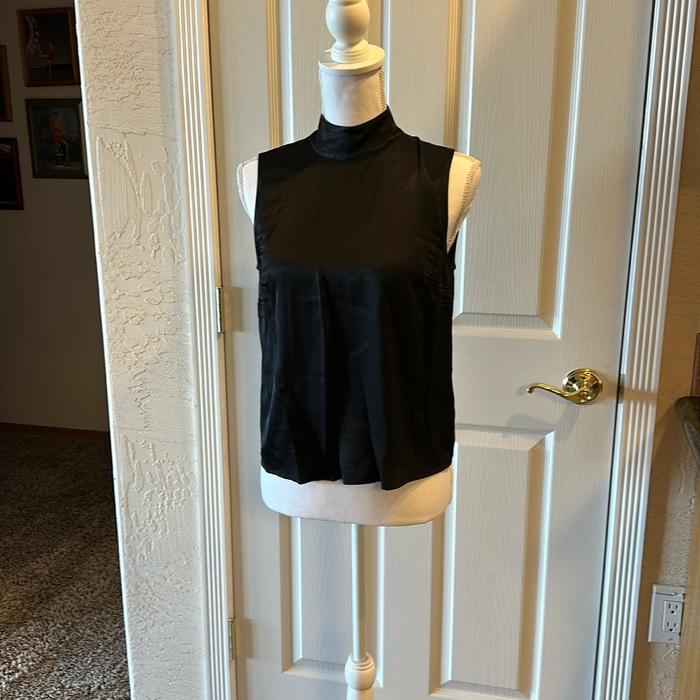 Sleeveless black top